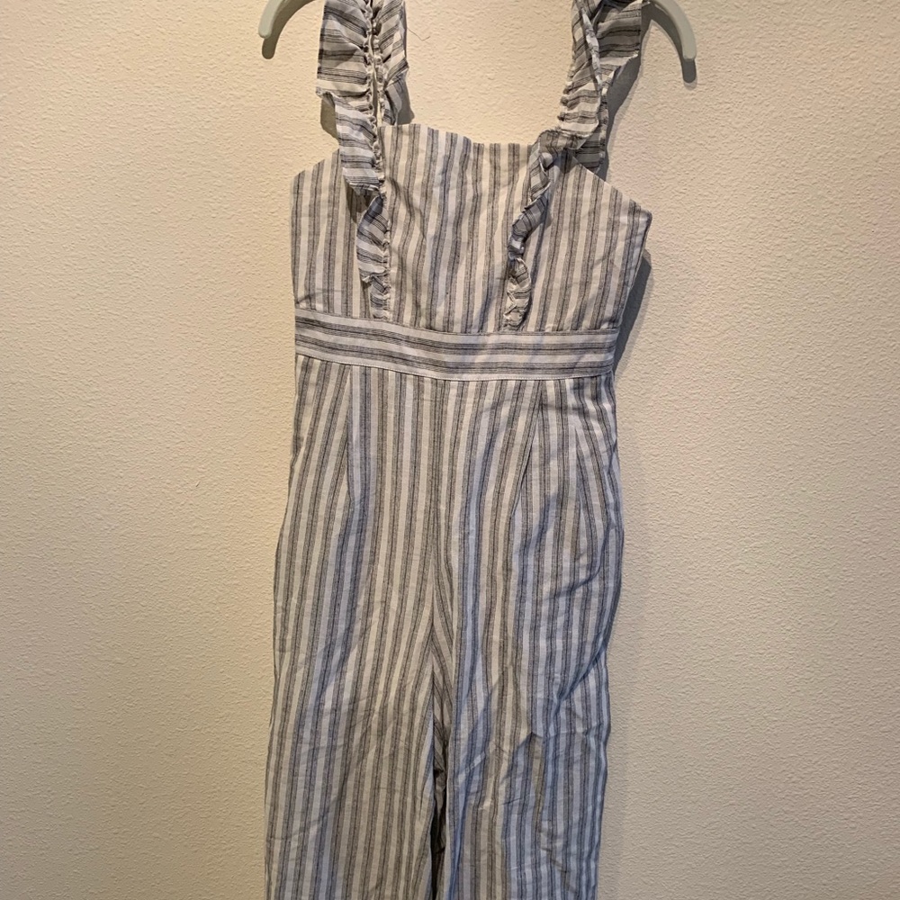 Small grey/white jumpsuit romper